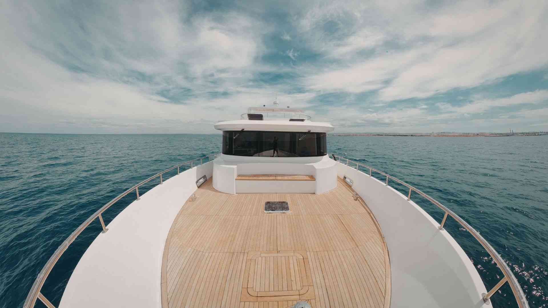 By boat on the water surface of the Earth