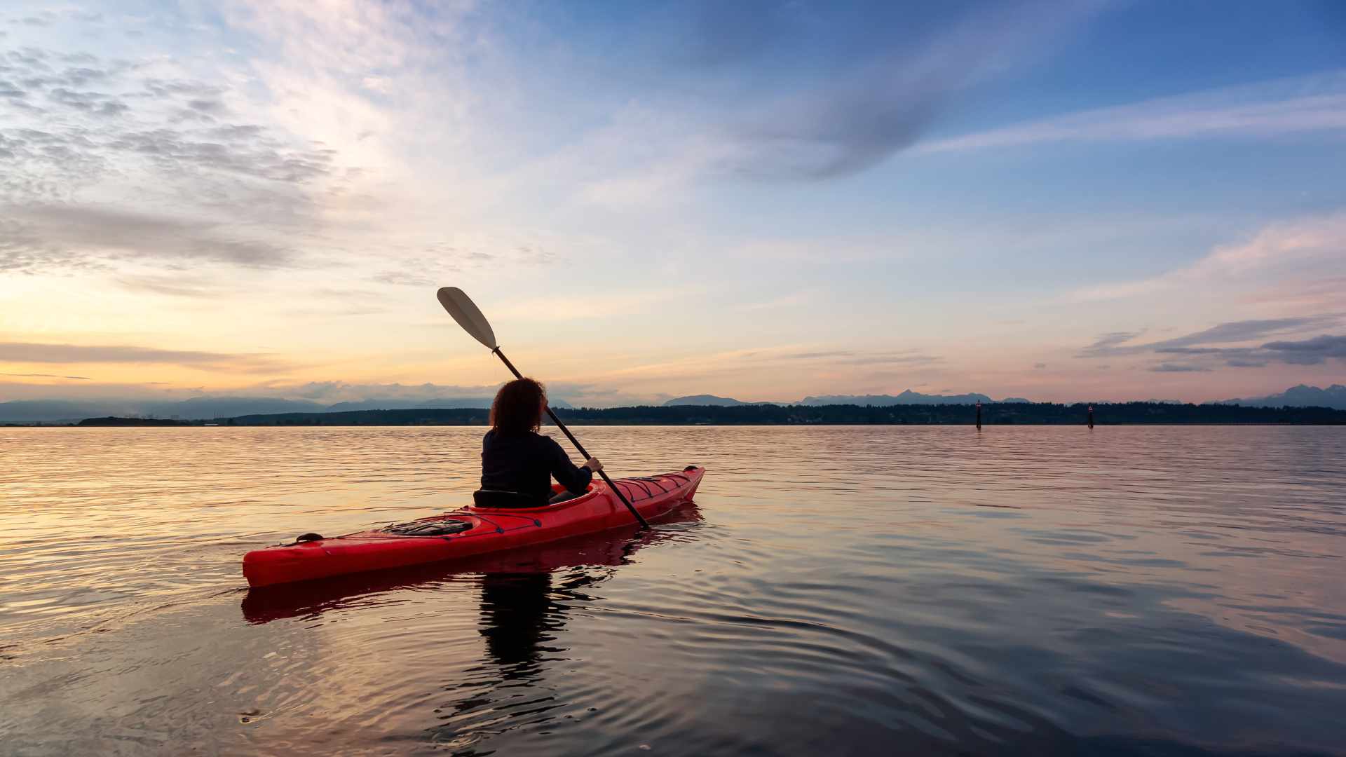 Traveling on a water body by canoe